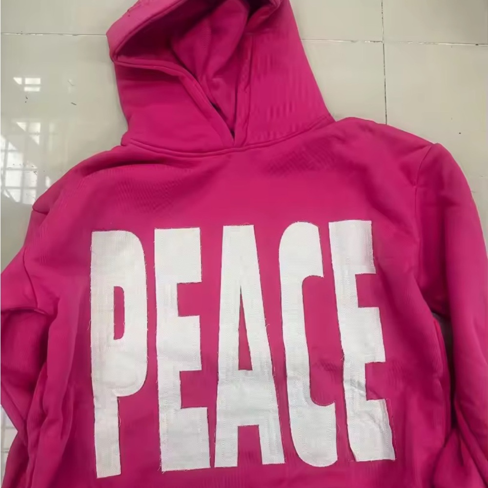 Pink Hoodie with 'PEACE' Graphic
